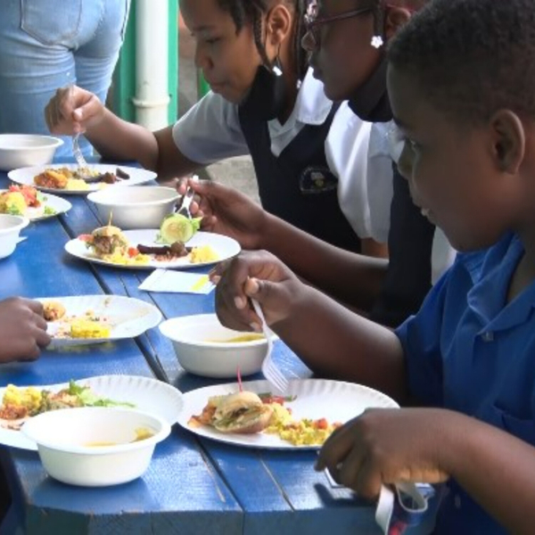 Education Minister Hon. Shawn Edward, meets with cooks from the School Feeding Programme artwork