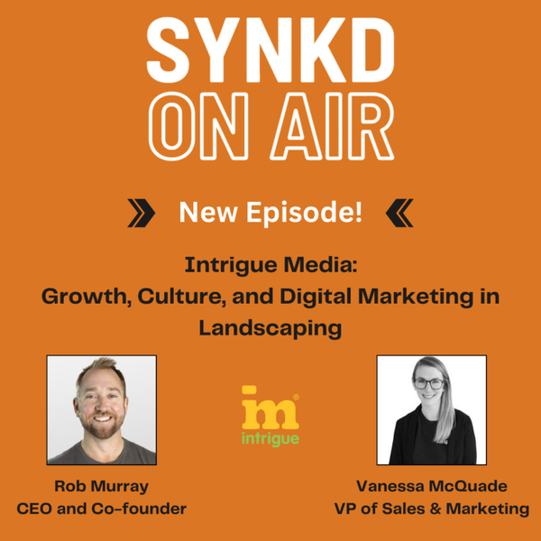 Rob and Vanessa with Intrigue Media artwork